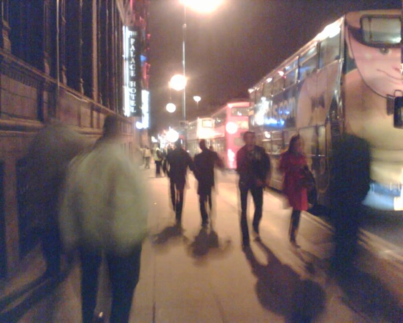A traffic jam of busses on Oxford road at night.